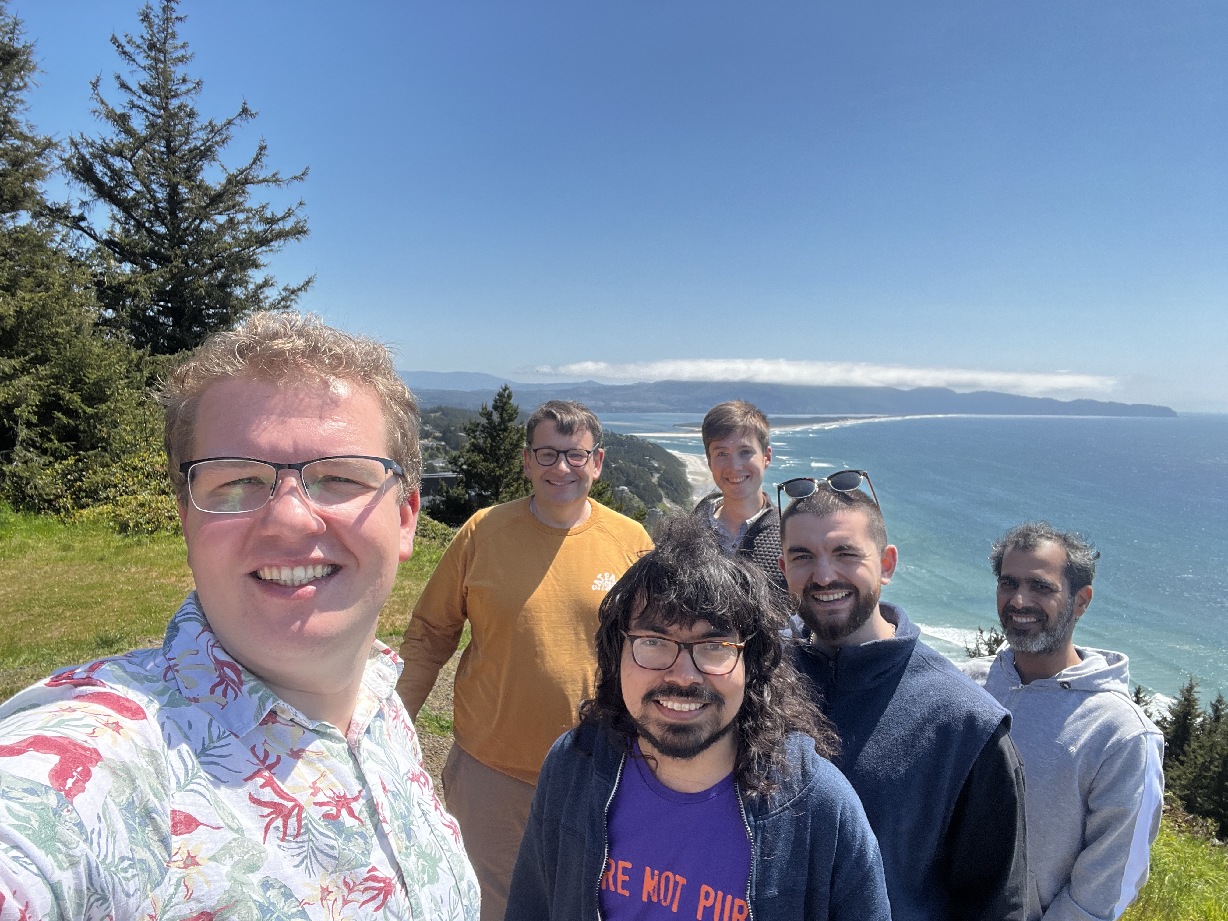 A selfie of the nembers of the Engineering Maths Department at the University of Bristol, UK, at the beach